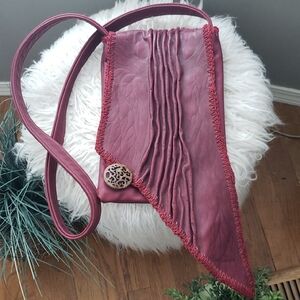 Elegant Burgundy Crossbody Bag with Unique Design